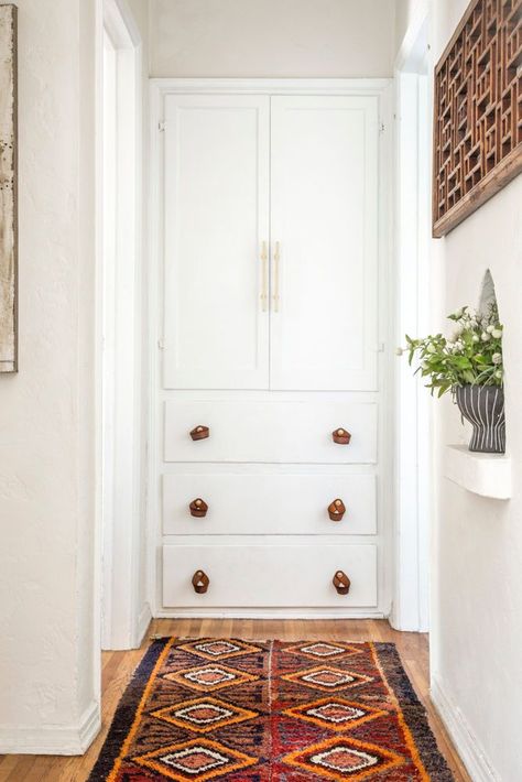 See more images from a must-see redesign (in a rental)! on domino.com End Of Hallway, Linen Closet Makeover, Hallway Closet, Floor Door, Closet Drawers, Linen Closet Organization, Hallway Designs, Hallway Design, Closet Organization Diy