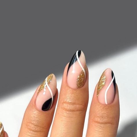 Marnie 🍒🌸🦋🌈✨ on Instagram: "black and gold swirls for new years 🖤✨  #nails #nailinspo #nailart #naildesign #newyearsnails #nyenails #festivenails" Black And Gold Minimalist Nails, Black White Gold And Silver Nails, Mizzou Nails Black Gold, Short Black Nails With Gold Design, Nails For A Black Tie Event, Short Nails Swirl Design, Nails To Go With Gold Dress, Black White And Gold Nails Design, Black French With Gold