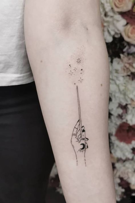 25 Great Halloween Tattoo Art Ideas to Make You Enjoy The Holiday Atmosphere All Year Witch Magic Tattoo, Magic Wand Finger Tattoo, Hp Wand Tattoo, Witch Wand Tattoo, Magic Dust Tattoo, You Are Magic Tattoo, Magic Stick Tattoo, Harry Potter Wand Tattoos, Wand Tattoo Ideas