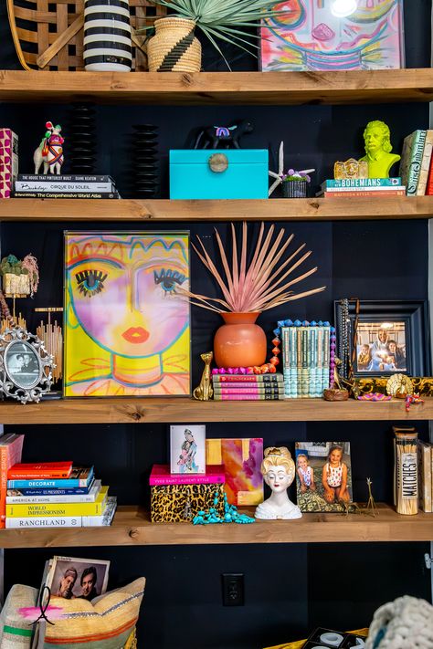 Life is too short to not add color to your home! Check out these colorful shelves in the home of a luxury interior designer in Dallas, TX!  #shelves #shelf #colorfulshelves #colorfulinteriordesign #brightinteriordesign #color Maximalist Shelf Decor, Modern Bookshelf Styling, Colorful Shelves, Colorful Bookshelves, Mahogany Office, Gallery Shelf, Bright Color Decor, Bright Interior Design, Colorful Shelf