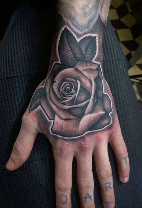 Rose tattoo 20 ideas for men: Unlocking masculine symbolism and timeless elegance Rose Tattoo For Hand, Black And Grey Rose Tattoo Realistic, Rose Tattoo In Hand, Rose Reference Black And Grey, Angel Rose Tattoo, Shading Tattoo Ideas, Rose Tattoo Realistic, Realism Rose Tattoo, Rose Tattoo Black And Grey