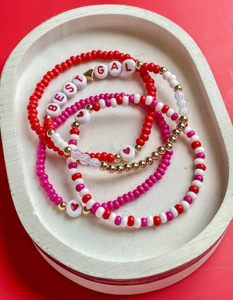 Valentine's themed bracelets. $10 PER strand. Can be personalized. Galentines Friendship Bracelets, Valentine Day Bracelets, Valentines Diy Bracelets, Valentine Friendship Bracelet, Valentines Bracelets Diy, Valentine’s Day Bracelet Ideas, Valentine Bracelets, Valentine Accessories, Valentines Day Bracelet