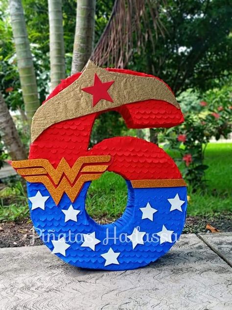 Wonder Woman Pinata, Wonder Woman Birthday Party Ideas, Wonder Woman Party Ideas, Supergirl Birthday, Monster Inc Cakes, Wonder Woman Birthday Party, Women Party Ideas, Wonder Woman Party, Wonder Woman Birthday