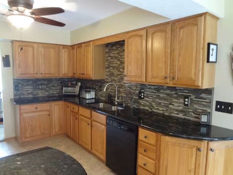 Updating Oak Kitchen Cabinets, Updating Oak Kitchen, Updating Oak Cabinets, Glass Kitchen Countertops, Kitchen Cabinets Before And After, Flagstaff House, Maple Cabinet, Kitchen Table Oak, Black Countertop