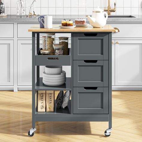 This kitchen serving cart offers extra storage space to hold kitchen utensils, and prepared food; you can also easily move around the kitchen, dining room, or garden to enjoy mealtime or teatime with family and friends.FeaturesStable Structure: Thick pine wood top on 4 sturdy legs & P2 grade MDF can support weight up to 300lbs without shaking; painted in smooth food-safe finish makes them waterproof and scratch-proof for easy cleaning and food preparation.Large Storage Space: The wide top of Rolling Kitchen Cart, Island Cart, Rolling Kitchen Island, Kitchen Island Cart, Wood Kitchen Island, Serving Cart, Dining Room Storage, Drawer Shelves, Kitchen Roll