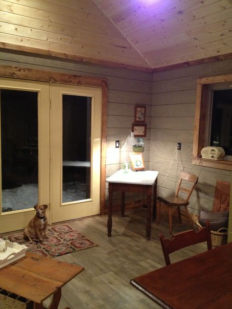 Another view of the tongue and groove pine ceiling.  The walls are the same T-111 siding which covers the outside of the Studio  installed horizontally and stained the exterior's accent color.  Where I create this: https://www.etsy.com/shop/JillEdwardsDesigns Christmas Eclectic, T1 11 Siding, Tongue And Groove Walls, Upcycled Home, Walls Ideas, Mom In Law, Valentines Birthday, Pine Walls, Christmas Idea