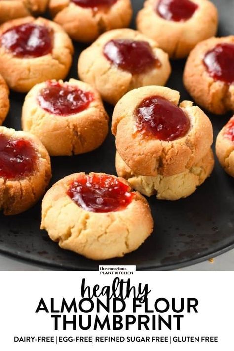 easy, healthy, vegan, gluten-free almond flour thumbprint cookies with jam Almond Flour Thumbprint Cookies, Moist Cookies, Cookies Made With Almond Flour, Vegan Gluten Free Cookies, Jam Thumbprint Cookies, Vegan Christmas Cookies, Thumbprint Cookies Recipe, Almond Flour Cookies, Delicious Christmas Cookies