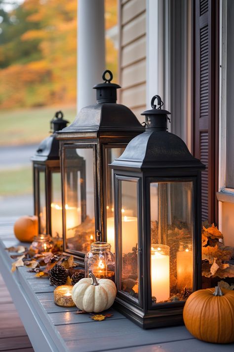 Cozy fall decor with lanterns, pumpkins, and candles on a small porch. Perfect tiny front porch fall decor inspiration for an inviting autumn vibe. Farmhouse Lantern Decor Ideas, Fall Lantern Decor Ideas, Hallmark Aesthetic, Fall Lantern Decor, Outdoor Fall Decor Ideas, Fall Lanterns, Fall Front Porch Decor Ideas, Fall Lantern, Mulling Spices