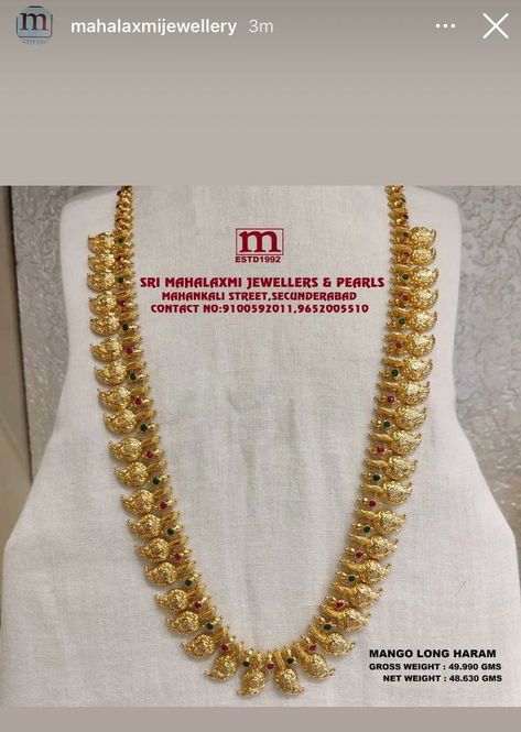 Very Light Weight New Collection Added Mango Long Haram In The Stock Studded with Ruby And Emerald. VISIT OUR SHOWROOM FOR FULL RANGE OF WEDDING COLLECTION AT WHOLESALE PRICES Please call WHATSAPP VIDEO CALL NO. 9100592011, 9652005510 www.srimahalaxmijewellers.in #SriMahalaxmiJewellers #MahalaxmiJewellers #longharam #mangolongharam #mangoharam #tradional #tradionalwear #southindian #southindianwear #bridalwear #partywear #bridaljewellery Long Mango Haram Designs Indian, Plain Haram Gold, Gold Mango Haram Designs With Grams, Light Weight Gold Long Harams, Light Weight Mango Haram Designs, Long Harams Under 40 Grams, Latest Mango Haram Designs With Grams, One Gram Gold Jewellery With Price Long Haram, Light Weight Gold Haram Designs