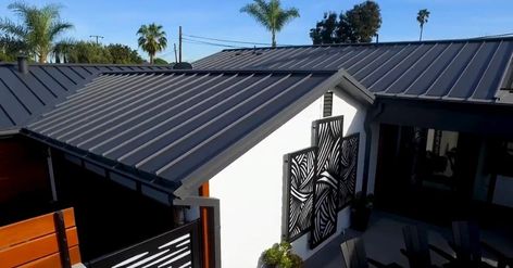 black-ore-matte-standing-seam-metal-roof Black Roof House, House Philippines, Metal Roof Panels, Black Metal Roof, Metal Roofing Systems, California Craftsman, Metal Roof Colors, Standing Seam Roof, Black Roof