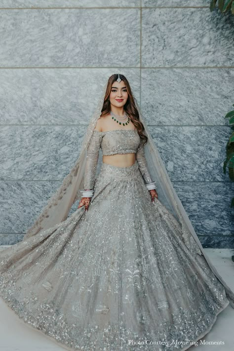 Luxury Traditional Silver Lehenga, Silver Bridal Lehenga, White And Silver Lehenga Bridal, Silver Lehenga Bridal, Silver Lehenga, Silver Fitted Lehenga For Wedding, Silver Unstitched Lehenga For Reception, Silver Lehenga With Intricate Embroidery For Wedding, White Engagement Dresses