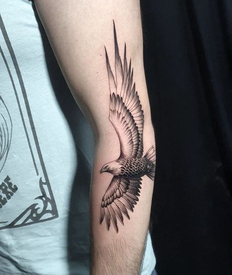 215+ Hawk Tattoos Ideas and Designs (2023) - TattoosBoyGirl Bird Tattoo Elbow, Fineline Eagle Tattoo, Eagle Sketch Tattoo, Eagle Tattoos For Women, Simple Eagle Tattoo, Eagle Tattoo For Women, Hawk Tattoos, Eagle Tattoo Arm, Eagle Tattoo Ideas