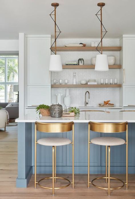 Gray wash shelves are mounted in front white herringbone backsplash tiles between stacked white cabinets and over a prep sink with a dark nickel gooseneck faucet. Herringbone Tiles Kitchen, Kitchen Island Finishes, Brass Kitchen Lighting, White Herringbone Backsplash, Gray Quartz Countertops, Herringbone Tile Backsplash, Blue Kitchen Island, Kitchen Island Tops, Instagram Breakfast