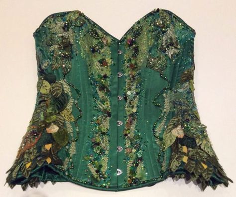 Bead embroidered green woman corset by Suzanne Forbes June 2017 Moss Embroidery On Clothes, Jamaica Moodboard, Tree Corset, Nature Corset, Corset Embroidery, Fairycore Corset, Corset Diy, Embroidery Corset, Moss Fairy