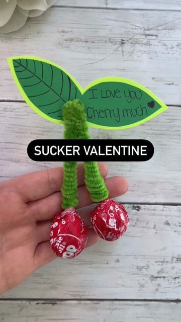 Kidscraftbarn on Instagram: "SUCKER CHERRY VALENTINE ❤️ All you need ⬇️ * 2 suckers * Pipe cleaner ( I used 3 total) * Hot glue to attach paper leaf I wrapped each stem with pipe cleaner, and then attached them at the top with a half a piece of pipe cleaner ❤️ Hope you give it a try! THANK YOU ALL FOR BEING HERE! #kidscrafts #valentinesdaygift #diyvalentines #easyideas #foryou" Valentines Day Pipe Cleaner Crafts, Pipe Cleaner Lollipops, Valentines Lunch, Cherry Valentine, Craft Jobs, Valentines Treats, Valentines Puns, Pipe Cleaner Flowers, Paper Leaf