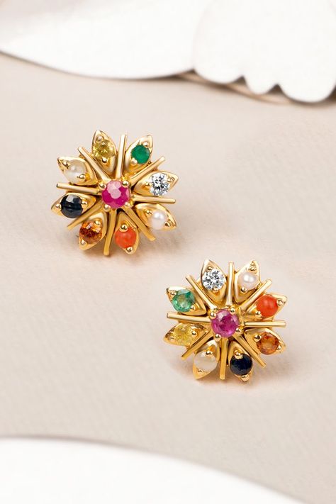 The perfect jewellery collection for you to be on cloud nine! Enjoy our latest blog on Navaratna Diamond Jewellery to learn about their benefits and how to wear them properly. #SunnyDiamonds #LikeNoOther #BISHallmark #conflictfreediamonds #CertifiedDiamondJewellery #internalflawlessdiamonds #diamondjewelleryindia #hallmarkedjewellery #navaratna #navaratnajewelry #navaratnanecklace #navaratnaring #navaratnapendants #diamond #diamondjewellery Navaratna Earrings, Navaratna Jewellery, Emerald Stone Rings, Gold Earrings Wedding, On Cloud Nine, Bridal Diamond Jewellery, Fancy Rings, Gold Bride Jewelry, Cloud Nine