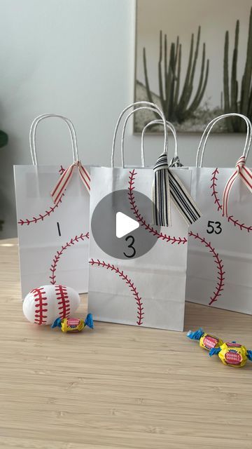 l i n z y ✌🏼 on Instagram: "You could also use good old paper bags and get the same effect! You don’t have to buy a bunch of stuff to make things special, paper bags and sharpies and the boys will be so excited to receive these ⚾️ so excited to watch my boys play some baseball again this season! #baseball #swingbatterbatter #snackduty #baseballmom #dollartreefinds #teeball" Diy Baseball Snack Bags, Baseball Bags Goodie, Baseball Bag Tags Diy, Baseball Party Favor Ideas, Baseball Tournament Goodie Bags, Baseball Goodie Bag Ideas, Baseball Goodie Bags For Players, Baseball Gift Bags, Baseball Treat Bags