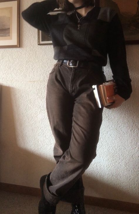 A mid-sized person/girl wearing a black/grey/brown grandpa sweater, dark brown wide cuffed men’s jeans, a thick belt, black platform dr. Martens and multiple crystal rings and bracelets. 		The person is also wearing multiple silver necklaces and is holding multiple books. Dark Academia Masculine Outfits, Dark Academia Gender Neutral, Dark Academia Sweater Outfit, Mad Scientist Outfit Aesthetic, Masculine Clothes Aesthetic, Masc Sweater Outfit, Crowcore Outfit Masc, Gender Neutral Dark Academia Outfits, Horror Academia Outfits