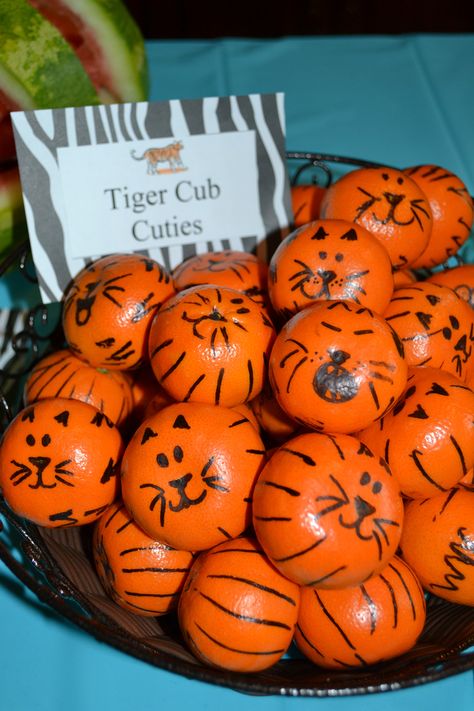 Zoo birthday party snacks: Tiger Cub Cuties. Mandarin oranges with Sharpie drawn faces and stripes Safari Birthday Party Food, Daniel Tiger Birthday Party, Tiger Birthday Party, Jungle Theme Birthday Party, Zoo Birthday Party, Jungle Safari Birthday, Wild Birthday Party, Tiger Birthday, Jungle Theme Parties