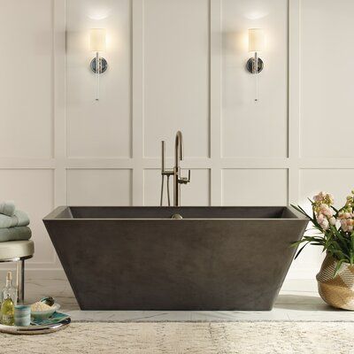 Native Trails Elevate your bathroom’s aesthetic with the Mendocino concrete bathtub. This freestanding tub radiates organic beauty; its clean lines make it a stunning focal point in modern farmhouse designs. The Mendocino’s thick walls provide insulation for long-lasting heat, while its slanted sides provide gentle support for enhanced comfort. An improved two-part sealer is proven to prevent staining, scratching, and cracking. Artisan crafted from a blend of concrete and natural jute fiber, the Walk In Shower Sizes, Cement Bathtub, Concrete Bathtub, Concrete Bath, Deep Tub, Shower Sizes, Standing Stone, Modern Farmhouse Design, Freestanding Tub