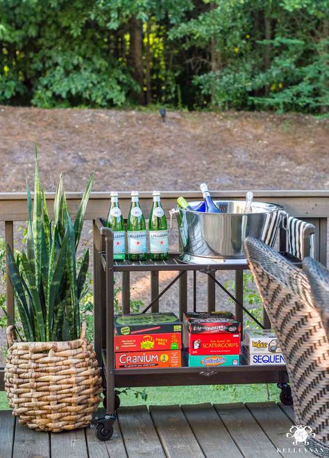 Outdoor bar cart setup for summer game night Outdoor Night Games, Night Games For Adults, Yard Crashers, Porch Parties, Game Night Parties, Summer Game, Bar Setup, Gold Bar Cart, Night Games