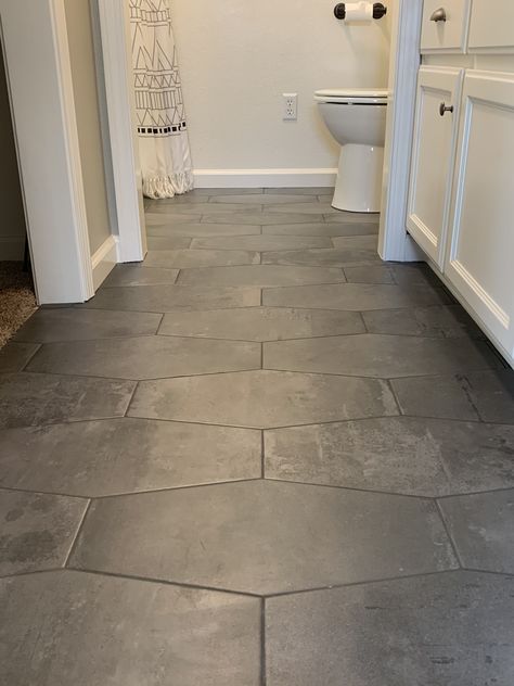 Tile Flooring In Bathroom, Dark Tiled Kitchen Floors, Tile Main Floor, Grey Entryway Tile Floor, Tile Bedroom Floor Ideas, Slate Grey Kitchen Floor, Bathroom Flooring Ideas Farmhouse, Bathroom Slate Tile Floor, Large Hexagon Tile Floor Bathroom