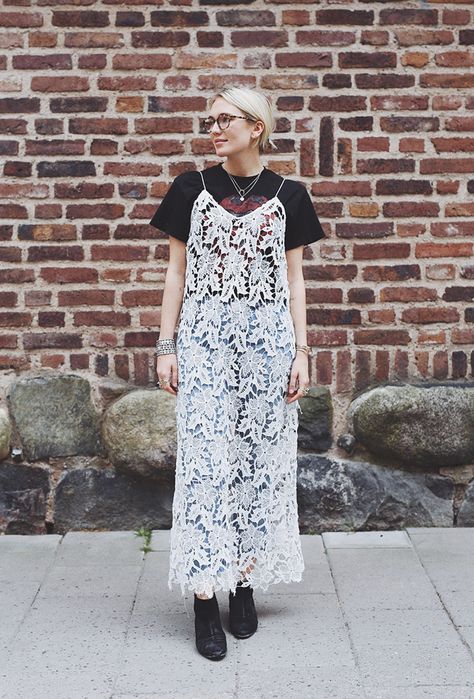 Transition your summer dresses into fall with these stylish outfit ideas for layering T-shirts | @josefindahlberg in white lace maxi dress, black graphic tee Under Dress Outfit, T Shirt Under Dress, Shirt Under Dress Outfit, Shirt Under Dress, Lace Dress Outfit, Working Dresses, Dress Layering, White Lace Maxi, Spring Outfits Dresses