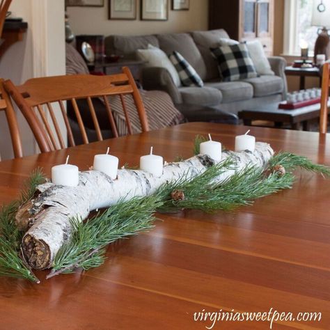 Grab a branch or log from the woods and use it to make a DIY Yule Log to use as a centerpiece on your dining room table, kitchen table, or your coffee table. I use mine all winter! Get more ideas for DIYs, crafts, and home decor on my blog, Sweet Pea. I live in Virginia where Birch trees do not grow but my friend visited Michigan and brought this Birch branch back to me because she knew that I would enjoy making something with it.If you don't have a Birch tree, any thick branch from… White Birch Logs Decor, Diy Yule Log, Birch Projects, Log Decorations, Yule Feast, Steampunk Candle Holder, Taper Candle Centerpiece, Birch Tree Decor, Yule Crafts