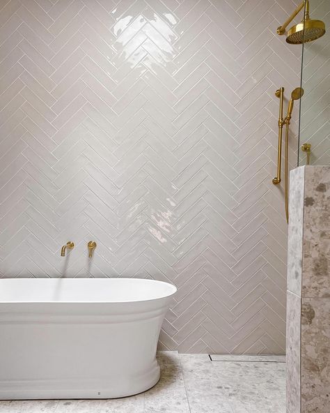 Our Newports in bone are the star of the show in this bathroom. Laying them in a herringbone pattern makes the room feel more traditional but in a modern colour. So beautiful 😍 Grey Terrazzo Bathroom, White Fish Scale Tile, Terrazzo Bathroom, Fish Scale Tile, White Terrazzo, Sample Box, Herringbone Tile, Grey Tiles, Grout Color