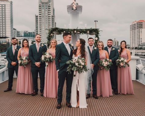 Florida Minimalistic Bride Holding Wild Eucalyptus Greenery and White Floral Bouquet and Groom with Wedding Party, Bridesmaids in Dusty Rose Matching Dresses, Groomsmen in Navy Blue and Blush Pink Ties | Tampa Bay Waterfront Wedding Venue Yacht StarShip | Wedding Hair and Makeup Femme Akoi Beauty Studio | Wedding Photographer and Videographer Bonnie Newman Creative Blush Wedding Dress And Bridesmaids, Dusty Rose Bridesmaid Dress Navy Blue Groomsmen, Dusty Rose Sage Green Navy Wedding, Canyon Rose And Navy Wedding, Dusky Rose And Navy Wedding, Navy Sage Pink Wedding, Sage Green Navy Blue Blush Pink Bridesmaids, Blush Pink Bridesmaid Dresses With Groomsmen, Navy Blue Suit With Dusty Pink Tie