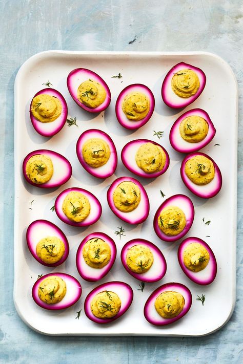 There are a million and one ways to make deviled eggs, but this one might just be the prettiest. Our Test Kitchen deems these Beet Dyed Deviled Eggs "certainly company-worthy," and we can't help but agree. #deviledeggs #appetizer #appetizerrecipes #easyappetizer #easterdeviledeggs #southernliving Pickled Deviled Eggs, Fancy Appetizers, Smoked Salmon Recipes, Grain Bowls, Pickled Eggs, Prepared Horseradish, Pickled Beets, Organic Eggs, Beet Juice