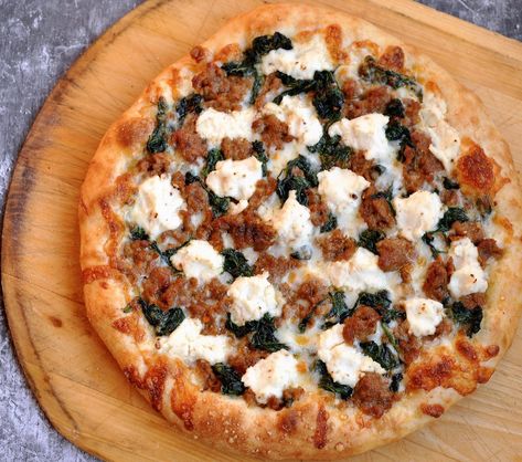 Recipe: Spicy Sausage, Spinach and Ricotta Pizza | Star Tribune Sausage Pizza Recipe, Italian Sausage Pizza, Ricotta Pizza, Pizza Recipes Pepperoni, Spinach Pizza, Sausage Spinach, Spinach And Ricotta, Sausage Pizza, Spinach Ricotta