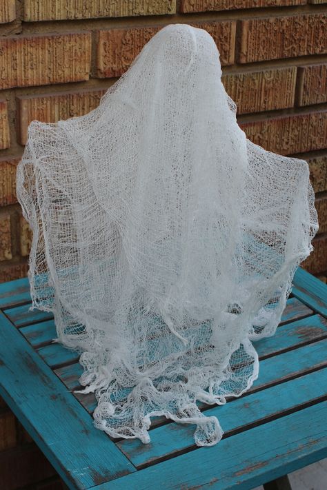 Large Cheesecloth Ghost, How To Make Ghost With Cheese Cloth, Cheesecloth Ghost Diy Starch, Gauze Ghosts Diy Crafts, Diy Ghost Cheesecloth, How To Make Starch Ghosts, Cheesecloth Ghost With Liquid Starch, How To Make Hanging Ghosts For Outside, Make Ghosts For Halloween