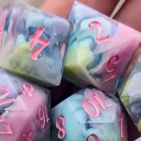 Kess (Sugarmoon Dice) on Instagram: "🌈 Rainbow Candy Fluff 🍭 Available this Saturday! I'll share my site with the listings up as previews to my stories today or tomorrow 🩷🩵 . . . . . #dnd5e #dnd #ttrpg #ttrpgdice #smallbusiness #polyhedraldice #tabletop #ttrpg #resinart #dicemaking #handmade #gamer #dice #pathfinder" D&d Dice Aesthetic, Dnd Dice Ideas, Resin Dice Tutorial, Resin Dice Ideas, Dnd Aesthetic Dice, D&d Crafts, Dnd Dice Aesthetic, D&d Aesthetic, Dnd Gift Ideas