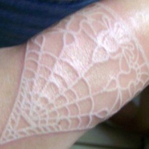 visit our site http://www.whiteinktattoosreview.com/ for more information on White Ink Tattoos.The advantage of a White Ink Tattoos is its unique look, subtle but distinctive, often appearing as a brand, but capable of more intricate detail and the added dimensional advantage of the slightly raised skin. Tattoo Pols, Lace Tattoo White, Lace Tattoos, Black Light Tattoo, Spider Web Tattoo, Lace Tattoo Design, Web Tattoo, White Spider, White Ink Tattoo