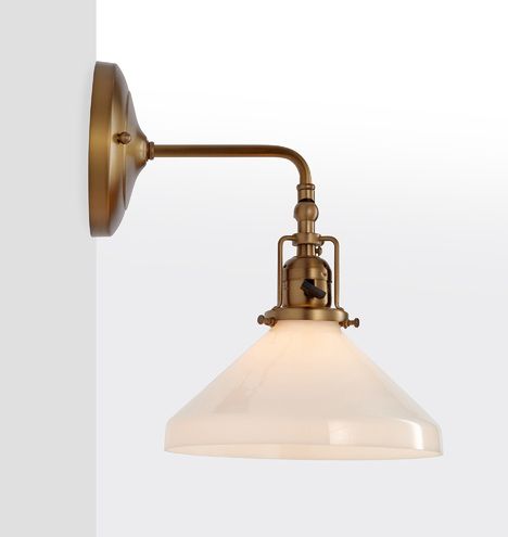 Agile and adaptable, the Fairview is the epitome of effective industrial lighting. Designed with an adjustable joint, you're able to choose the angle of light that's best, making this sconce ideal for bedside lighting, reading nooks, or workspaces. Crafted of solid brass, the Grandview features a turnkey socket (it can be turned on/off at the fixture or the wall switch) and a simple, handsome canopy. Fireplace Sconces, Anthropologie Wall, Vintage Home Offices, Antique Brass Sconces, Sink Lights, Cottage Lighting, Bar Stools Kitchen Island, Cabin Lighting, Lantern String Lights