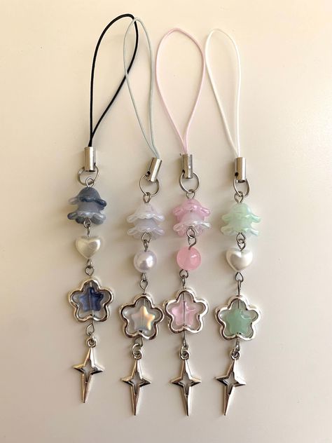 jellyfish phone charm, 14.5 inches (phone strap included) Water Themed Gifts, Phone Charm Designs, How To Make A Phone Charm Strap, Phone Keychain Ideas, Crafts With Charms, Jellyfish Keychain Beads, Jellyfish Phone Charm, Phone Strap Ideas, Phone Jewelry Accessories