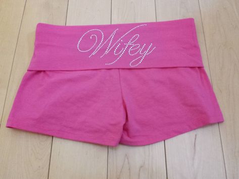 "This listing is for customized Fold Over Short Shorts with custom \"Wifey\" rhinestones.    These shorts are available in black, pink, charcoal and white. Please specify which you prefer :)  I also offer  Wifey in clear, pink or blue Bride in clear, pink or blue and clear bold font Bride to Be Maid of Honor  Matron of Honor Jr. Bridesmaid Flower Girl Just Married in clear and clear with pink Bridesmaid in clear or blue Brides Entourage  The inseam of these shorts is 2\" They are 95% cotton and 5% spandex.  The rhinestones are clear and placed on the fold over portion on the back of the shorts.    Great item for a the bride to get ready in or a gift for the wedding shower.  If you are interested in purchasing more than one please contact us and we will get sizes and send you an invoice :). Fold Over Shorts, Bride Shorts, Short Rosa, Rhinestone Shorts, Jr Bridesmaid, Short Bride, Blue Bride, Short Blanc, Bridesmaid Flower