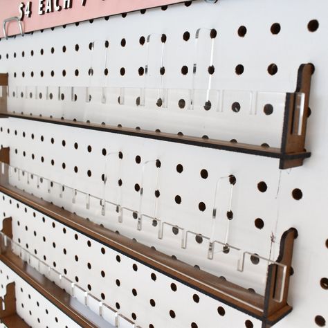 Sticker Ledges with Dividers – KynYouBelieveIt Vendor Booth Sticker Display, Pegboard Display Craft Show, Sticker Display Ideas Retail, Patch Display Ideas, Market Displays Booth Ideas, Pegboard Shelves, Price Signage, Black Pegboard, Sticker Display