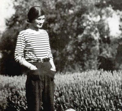 Coco Chanel Biography |  Biography Online Breton Shirt, Cristobal Balenciaga, Coco Chanel Fashion, Breton Top, Sailor Shirt, Breton Stripes, Mode Chanel, Gabrielle Chanel, Nautical Stripes