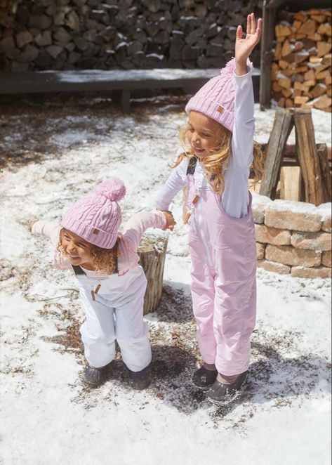 Sibling mix and match, girls winter outfit, sisters winter outfit, pink winter coat, pink snow pants, cute pink winter hat, pink beanie, classic kids, chic winter style, matching outfits, ski jacket, toddler snow oants, kids snow pants, white snow pants for kids Kids Snow Outfits, Toddler Snow Outfit, Pink Winter Coat, Winter Outfits Snow, Chic Winter Style, Kids Winter Outfits, Baby Snowsuit, Kids Winter Hats, Winter Outfits For Girls