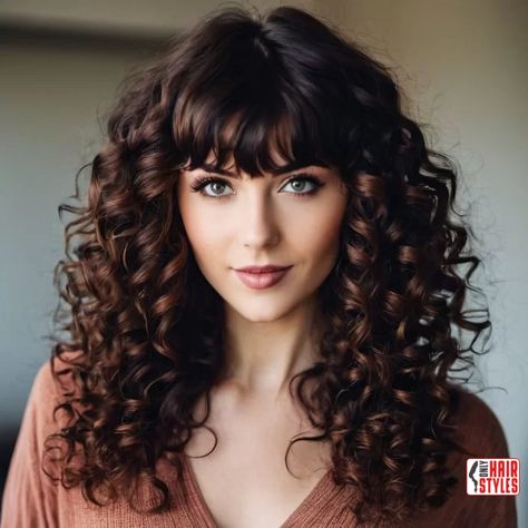 1. Long Curly Hair with Bangs | 60 Best Curly Hairstyles With Bangs For A Stunning Look! Welcome to the world of irresistible curls and chic bangs! If you're ready to embrace a bold and beautiful transformation, you've come to the right place. In this comprehensive guide, we'll navigate the exciting realm of curly hairstyles with bangs, showcasing the 60 best. Long Hair Perm With Bangs, Straight Fringe Curly Hair, Long Curly With Bangs, Long Curly Hair With Straight Bangs, Medium Curly Hair Styles With Bangs, Permed Hair With Bangs, Spiral Perm With Bangs, Bangs With Curly Hair Natural Curls, Bangs For Wavy Curly Hair