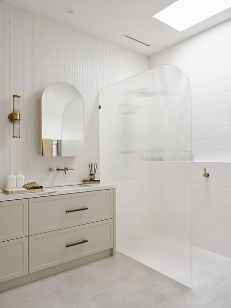 Essendon II - Residential Interior Design — Vision Design Studio Arch Mirror Cabinet, Arched Shower Screen, Arch Shower Screen, Bathroom 2024 Design Trends, Beige Bathroom Cabinets, Bathroom Vanity Beige, Fluted Glass Shower Screen, Provincial Bathroom, Bathroom Beige