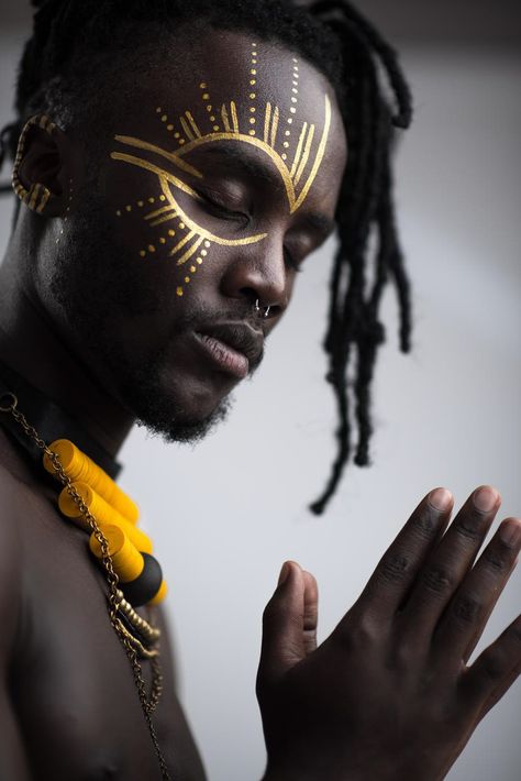 African Themed Makeup, Aboriginal Face Painting, African Warrior Face Paint, Gold Face Paint Designs, Egyptian Eye Makeup Men, Egyptian Face Paint, Egyptian Makeup Men, Rave Makeup Men, Zeus Makeup