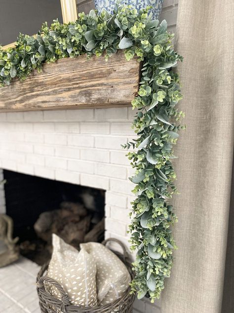 "Greenery Garland! We are so excited to be sharing with you our favorite product, Lambs ear and eucalyptus Greenery Garland. This faux garland is easy to maintain, as well as being incredibly stylish. You will love how it compliments any space and adds an instant pop of color. Its versatile style can be used in many different ways - from living room to bedroom; from holiday to year round décor; weddings and events! 📢Explore our shop now to discover so many great home accents Click here to See Eucalyptus Garland Mantle, Mantle Greenery, Garland On Mantle, Spring Fireplace Decor, Table Greenery, Garland For Mantle, Spring Mantle Decor, Garland Mantle, Spring Mantle