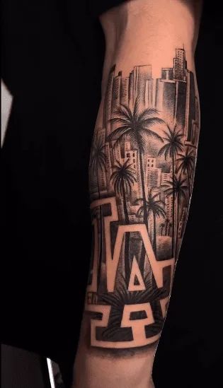 30+ Los Angeles Tattoo Ideas To Show Your Love For Tinseltown! City Tattoo Ideas For Men Sleeve, Los Angeles Leg Tattoo, California Tattoos Men, Los Angeles Sleeve Tattoo, Leg Tattoo Theme, La Themed Tattoo, Cali Tattoo Ideas For Men, California Style Tattoo, Long Beach California Tattoo Ideas