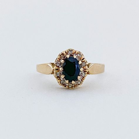 This classic beauty is just stunning! The deep blue sapphire is encircled by a halo of sparkling diamonds, reminiscent of a starry night sky 🌘✨ Dress Like A Royal, Dream Wedding Ring, Forever Mine, Gold Necklace Indian, Gold Necklace Indian Bridal Jewelry, Georgian Era, A Starry Night, Vintage Sapphire, Diamond Halo Ring