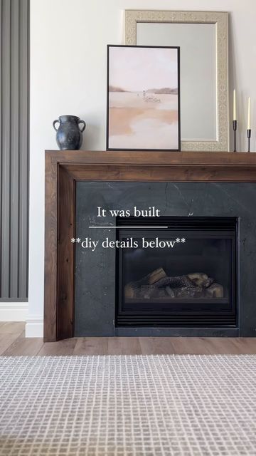 Andrea Nelson | Home Decor | Interior Decorating on Instagram: "How to DIY our fireplace mantle ⤵️  I get messages from people requesting the link to our mantle regularly.   It’s custom built by professional finish carpenters, but I’m going to give you all the info to DIY.  We had the BEST finish carpenters in all the land @awesometrimwork working on our home, and they custom built our mantle for a look we loved and so that we could match it to the wood beam and kitchenette wood stain we put in down there.  So… I reached out to thfor the details, and here’s what they said:  “We built the mantle using Clear Alder. It’s a pretty simple but sleek design. We ordered a 6” cove crown moulding from a local mill and ran that on the inside of our outer box. Then added a cleat for the inside of the Replacing A Fireplace Mantle, Custom Wood Fireplace Mantel, Hide Soundbar On Mantle, Mantle Surround Diy, Mantle Inspiration Living Rooms, Gas Fireplace With Wood Surround, Mantel Surround Ideas, Stained Fireplace Mantle, Wrap Fireplace Mantle