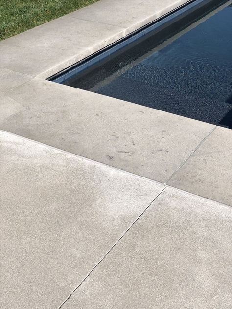 Pool coping and concrete surround Stamped Concrete Coping Around Pool, Pool With Concrete Decking, Stamped Concrete Pool Coping, Concrete Pool Coping Ideas, Pool With Concrete Surround, Pool Landscaping Small, Brushed Concrete Pool Deck, Small Backyard Pool Landscaping, Concrete Pool Surround