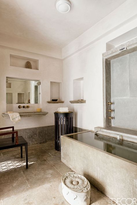 The neutral toned master bathroom in Paul Mathieu's home in Udaipur, India features a local Kota stone floor and hand-carved sink, and a chair, side table, and carved-stone step by Mathieu. Bathroom Designs India, Carved Sink, India House, Udaipur India, Dream Master, Master Bathrooms, Modern Flooring, India Design, Indian Homes